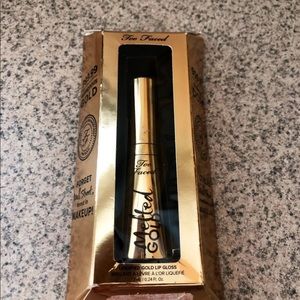 too faced liquified gold lip gloss ! New